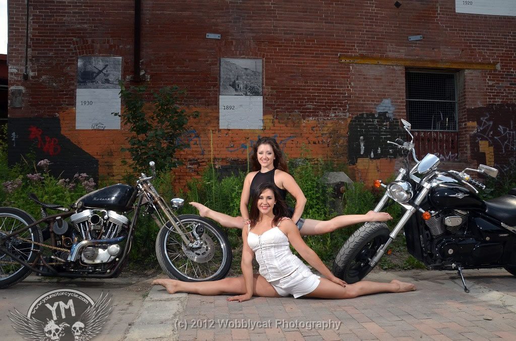 Contorionist-Doing-Splits-Two-Motorcycles.jpg